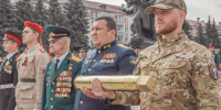 В Брянске стреляную гильзу с героической землёй передали защитникам Отечества - Знамя Труда